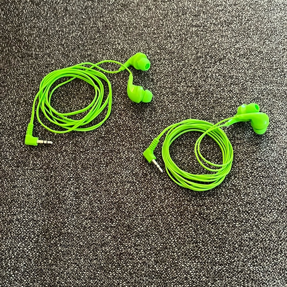 Pair of green headphones from Hawaii only used once